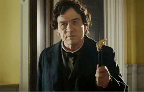 Tommy Lee Jones with cane