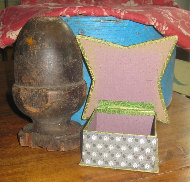 18. Pine Acorn Finial, Cardboard/Candy Box