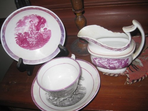 20. Lustreware Cup, Two Saucers, and Cream Pitcher