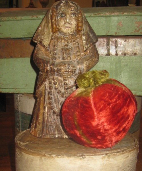 12. Lady Carved from Wood