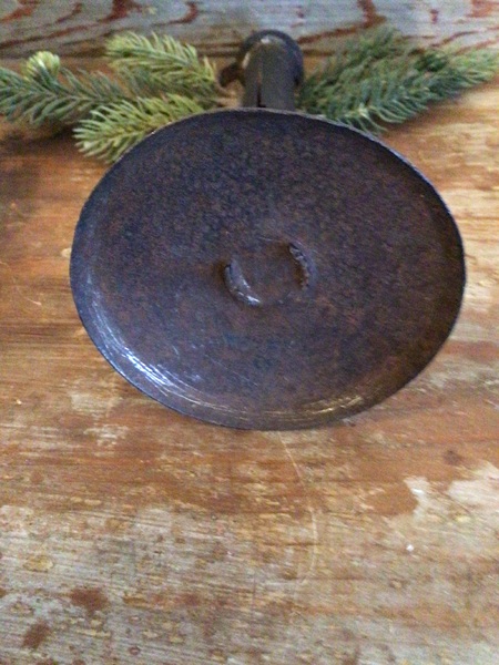 Early cleated hogs scrapper candlestick