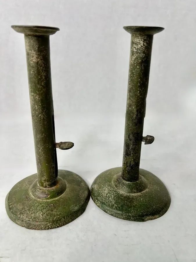 Pair of Green Painted Hogscraper Candlesticks