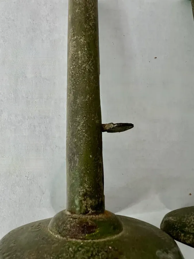Pair of Green Painted Hogscraper Candlesticks