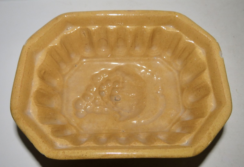 YELLOW WARE FOOD MOLD, GRAPE DESIGN