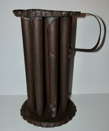 VERY SCARCE ROUND CANDLE MOLD, 19TH CENTURY