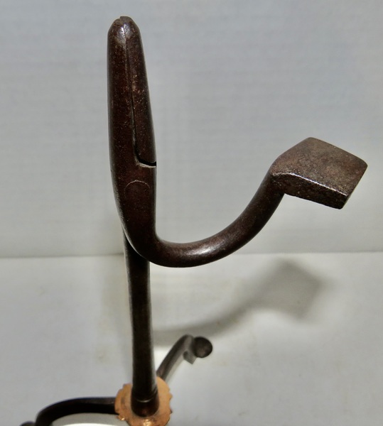 WHITE SMITHED RUSH LIGHT W/ COPPER DISK, 18TH C.