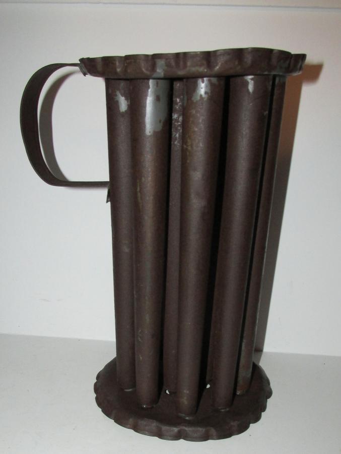 VERY SCARCE ROUND CANDLE MOLD, 19TH CENTURY