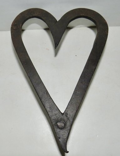 RARE FORM "BLEEDING HEART" TRIVET