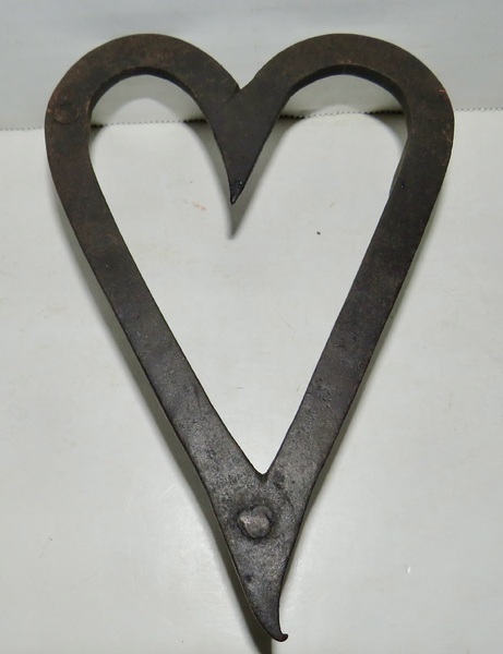 RARE FORM "BLEEDING HEART" TRIVET
