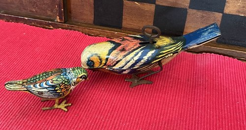 Two Tin Bird Toys