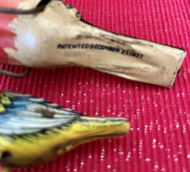 Two Tin Bird Toys