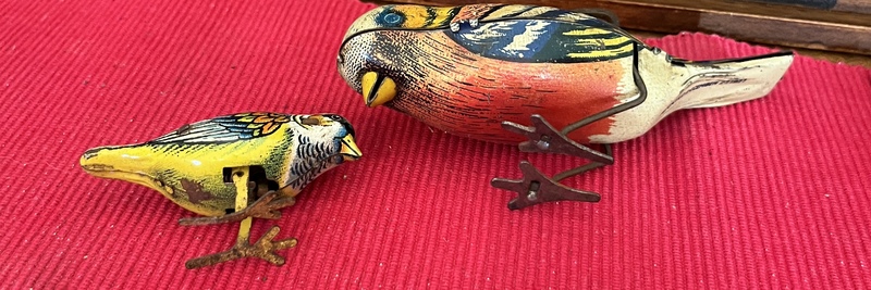 Two Tin Bird Toys