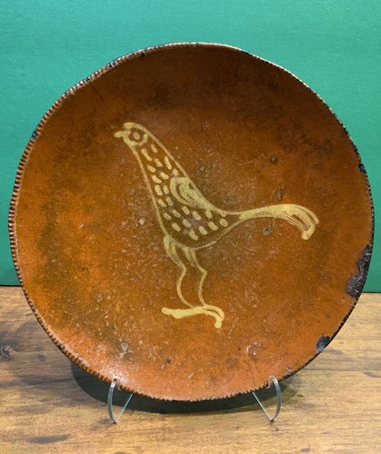 Redware Plate with a Yellow Slip Bird Decoration