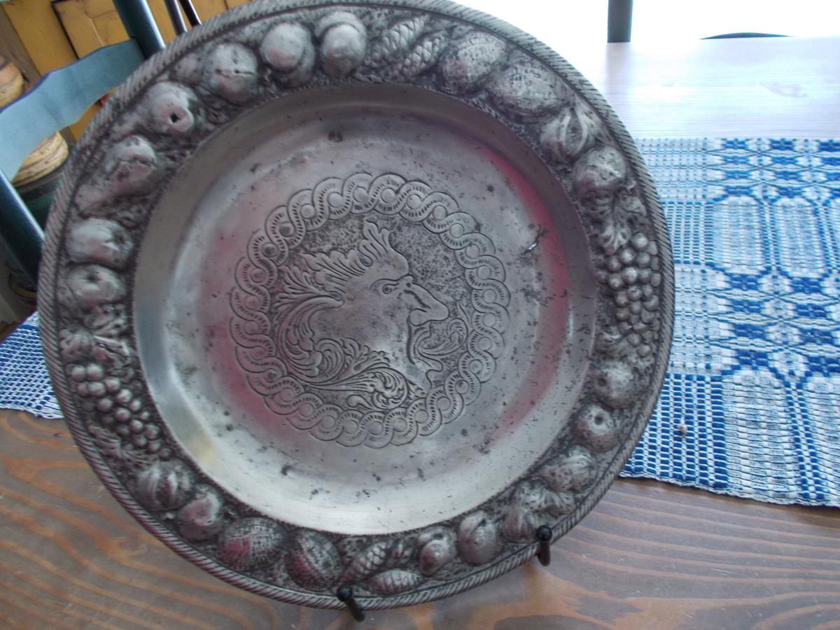 ODD METAL (PEWTER?) CHARGER