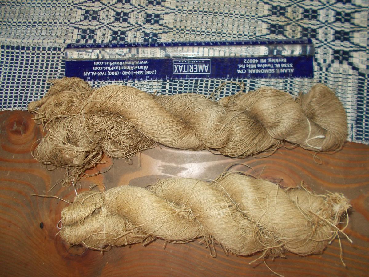 TWO SKEINS OF EARLY LINEN FLAX