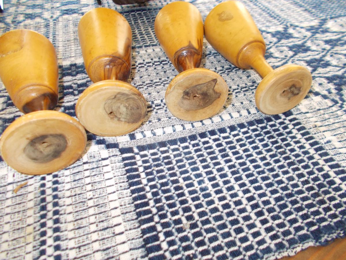 FOUR TREEN FOOTED DEMITASSE CUPS