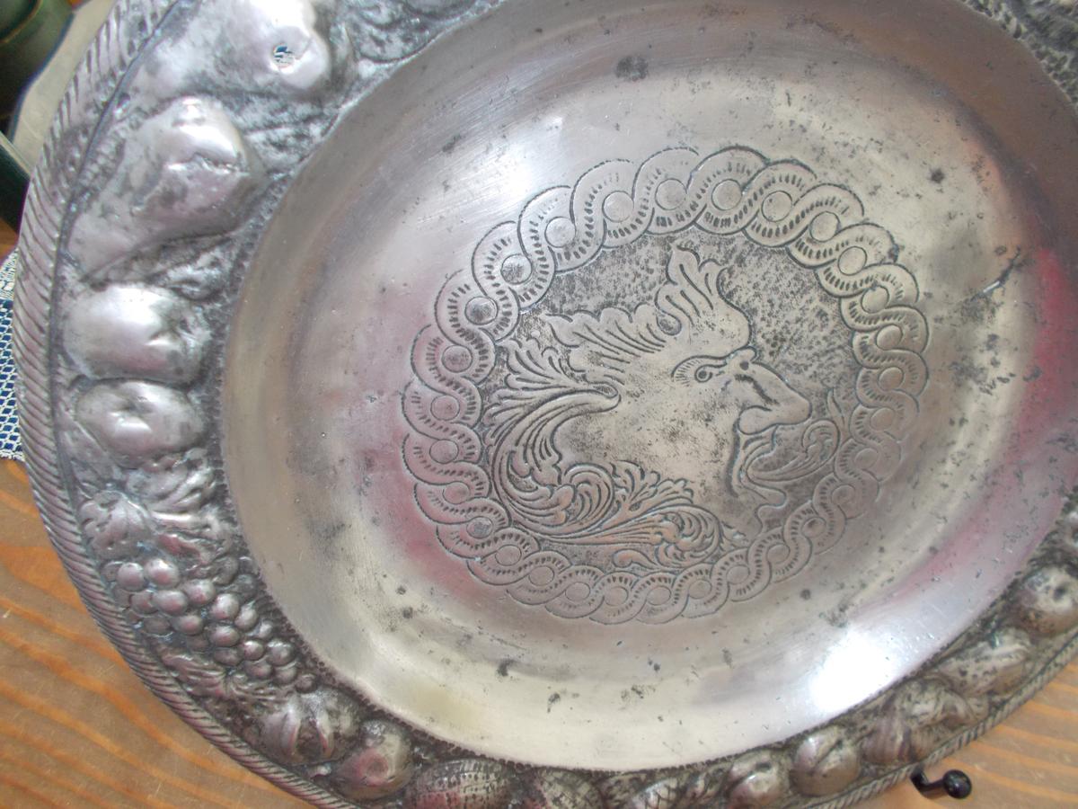 ODD METAL (PEWTER?) CHARGER