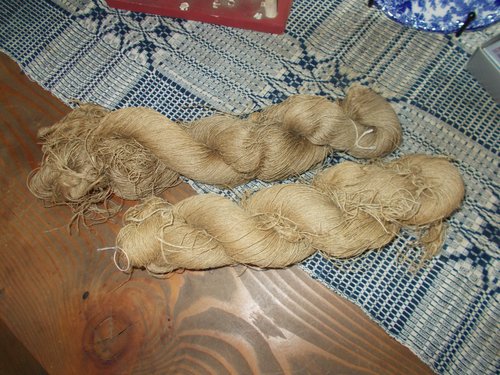 TWO SKEINS OF EARLY LINEN FLAX