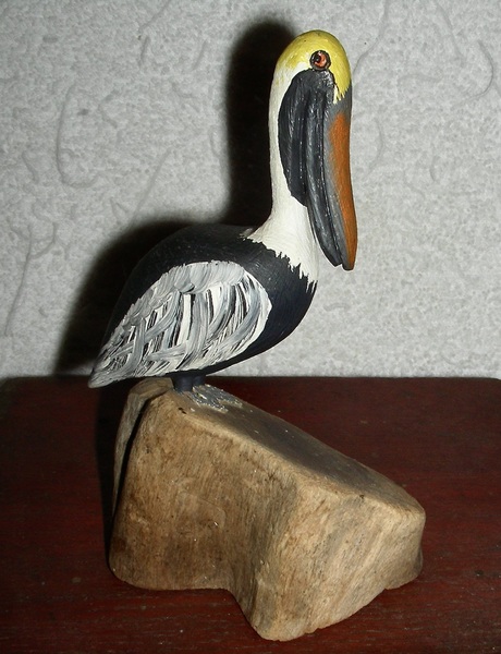 Small Carved Wooden Pelican on Stump