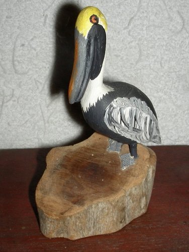 Small Carved Wooden Pelican on Stump