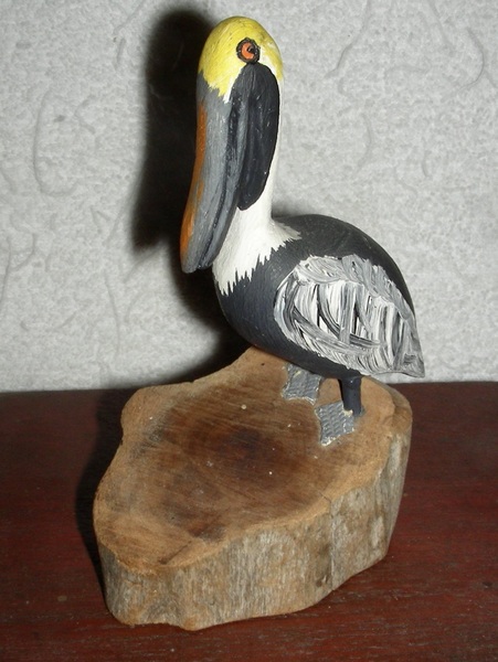 Small Carved Wooden Pelican on Stump