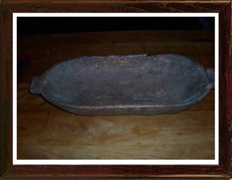 hand carved early trencher with spout