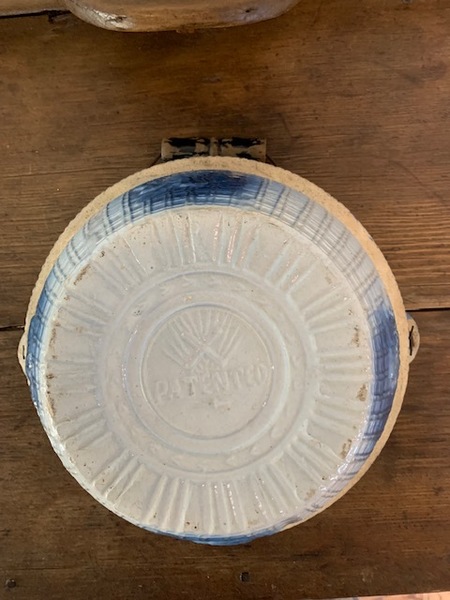 blue and white bail handled stoneware bowl