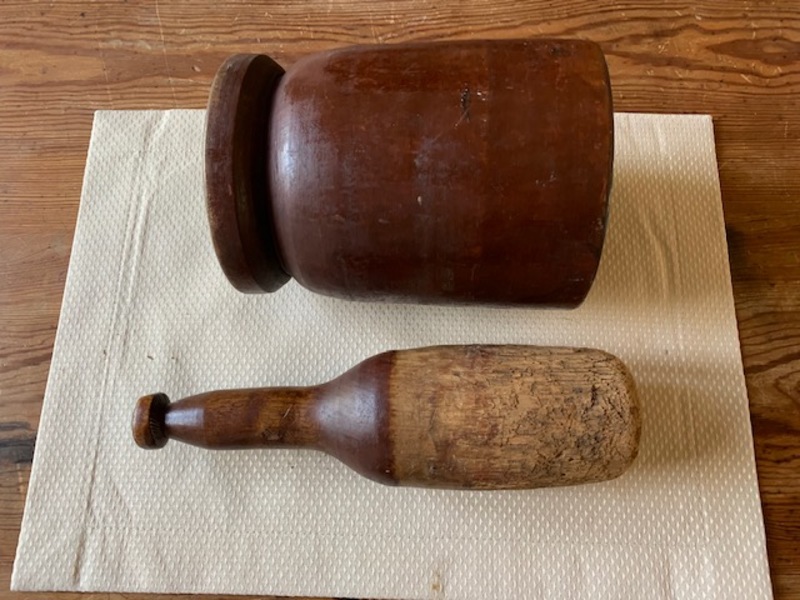 large wooden mortar and pestle