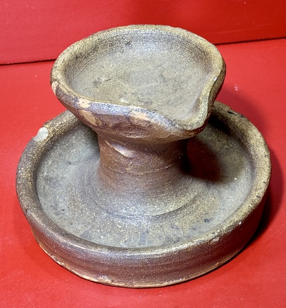 24-209. A Redware Fat Lamp