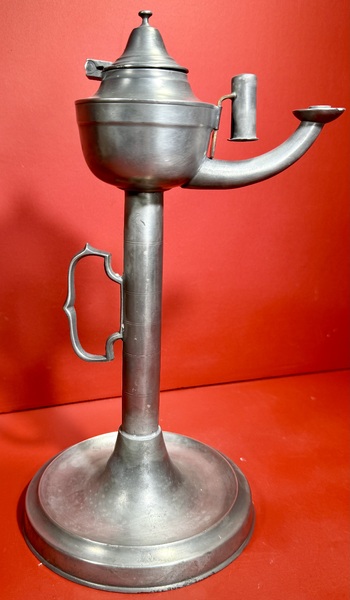 24-154. A Pewter fat / oil lamp