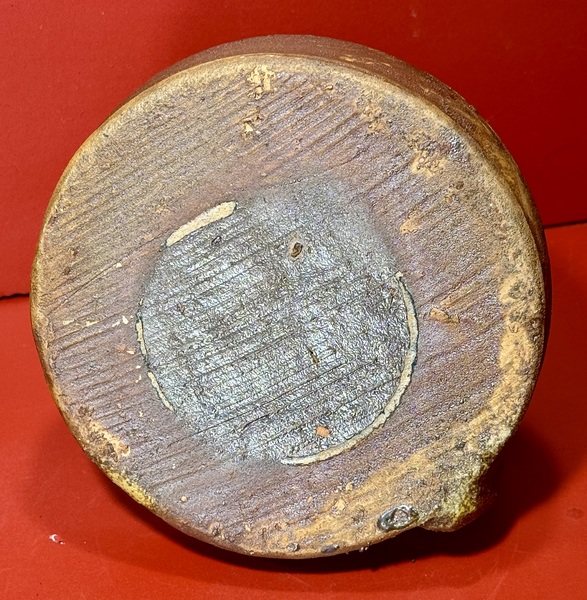 24-209. A Redware Fat Lamp