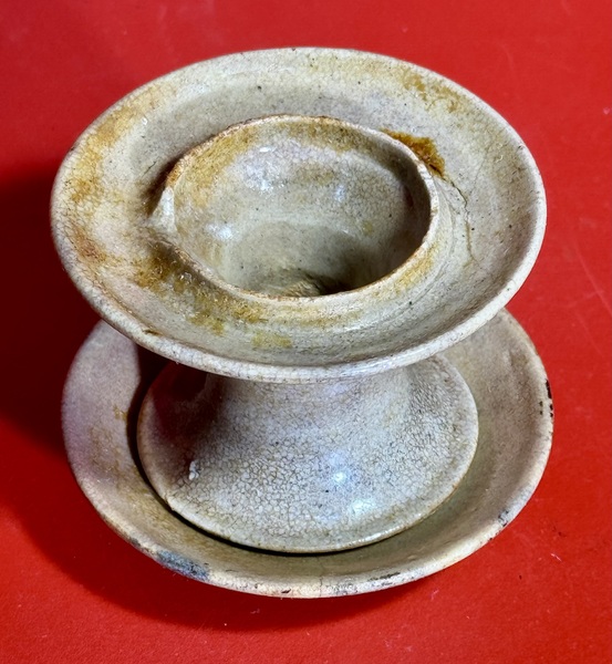 24-012. Ceramic pedestal and saucer oil lamp