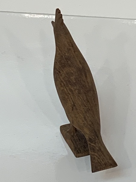 Carving of a Pileated woodpecker.