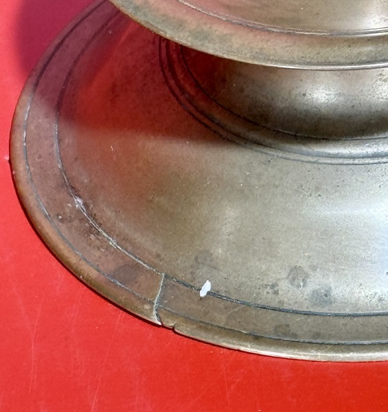 25-009. A Continental Brass "Capstan" Candlestick