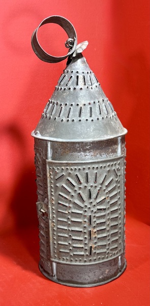 25-052. A Medium-Sized Punched Tin Candle Lantern
