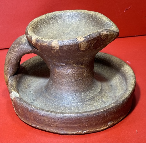 24-209. A Redware Fat Lamp