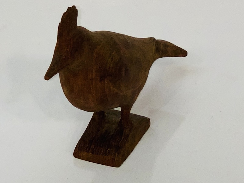 Carving of a Pileated woodpecker.