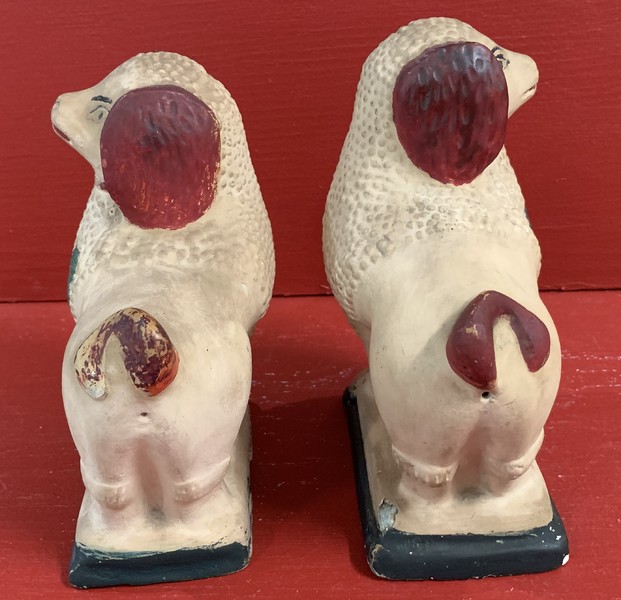 21-105. A true pair of PA chalkware Poodle dogs.
