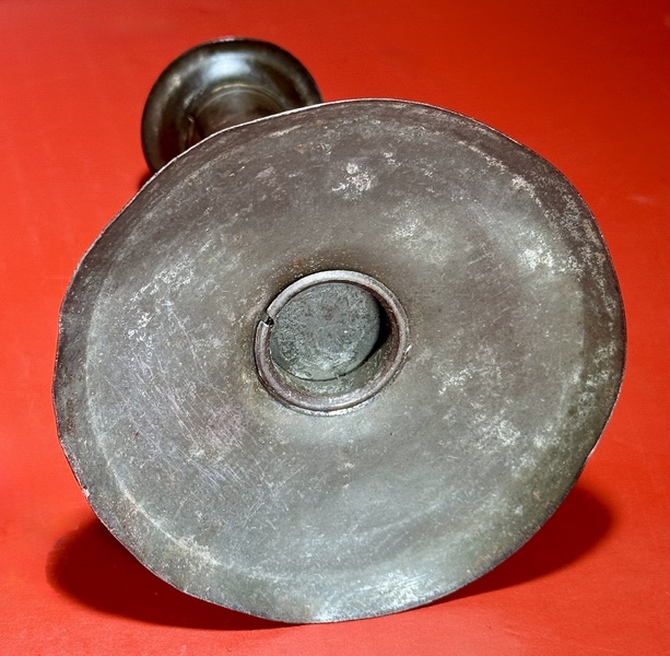 25-040. An Unusual Hog Scraper Candlestick
