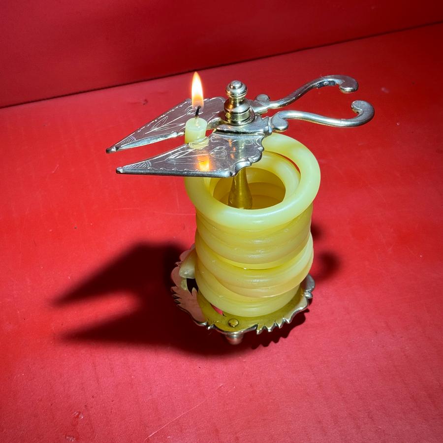 25-041 An Engraved Brass Wax Jack