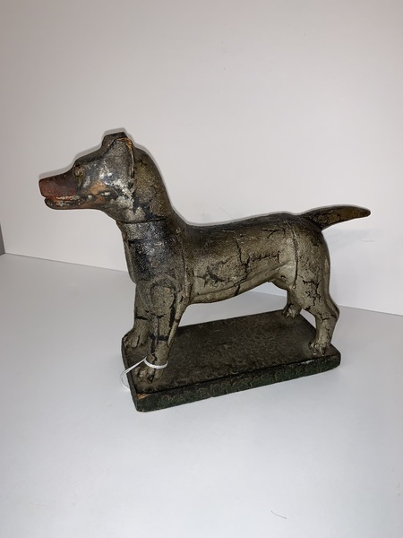 Folk Art carved standing dog.