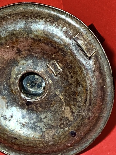23-115. Early tin chamber stick