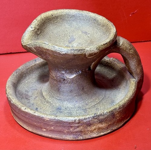 24-209. A Redware Fat Lamp