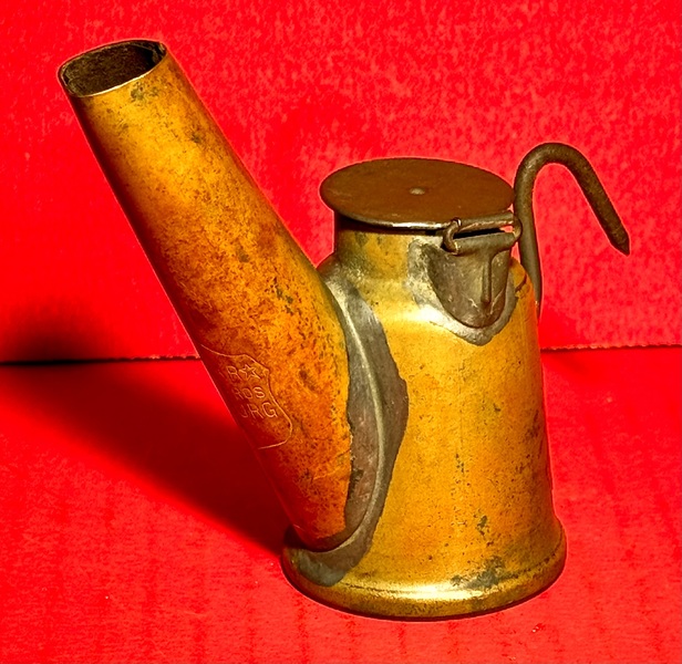 23-160. A small brass Miner's fluid lamp.