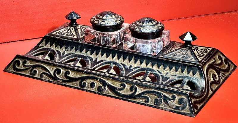 24-019. A two-well Cast-Iron ink well stand