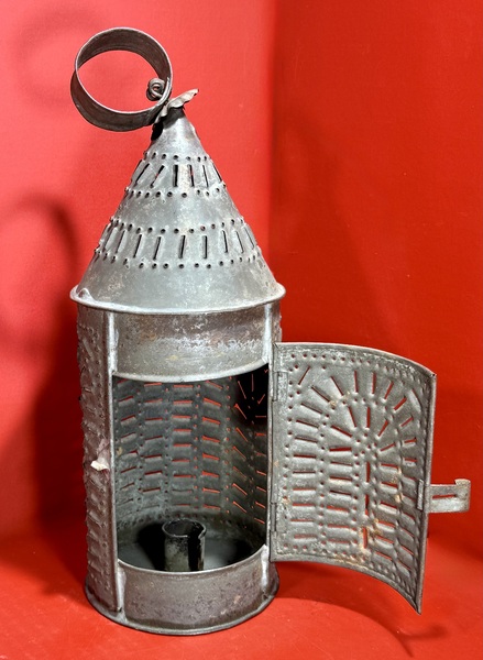 25-052. A Medium-Sized Punched Tin Candle Lantern
