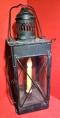 23-104. A candle lantern made of sheet iron