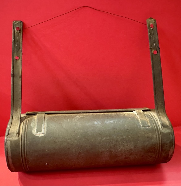 25-076. Cylindrical, pierced tin candle box
