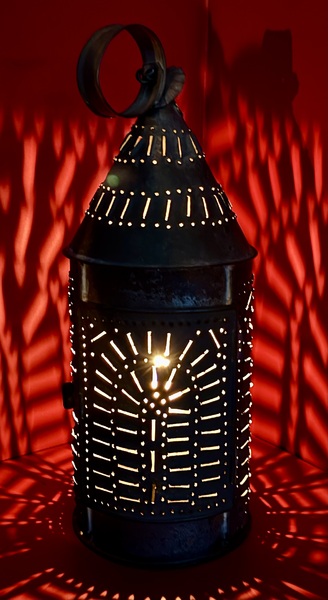25-052. A Medium-Sized Punched Tin Candle Lantern