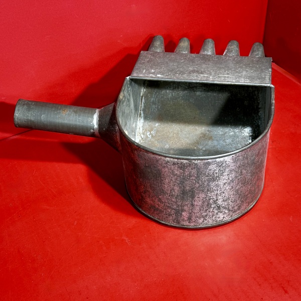 26-066. A Tin Candle Mold Wax-Filler